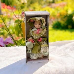 SHOW STOPPERS " LETA " PORCELAIN DOLL NEW AND NRFB 6 INCHES STANDING